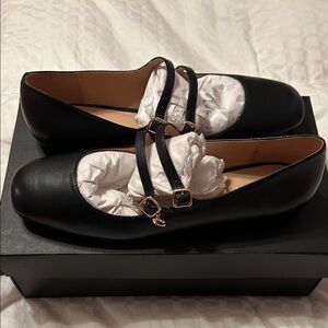 Coach flats with adorable strap detail